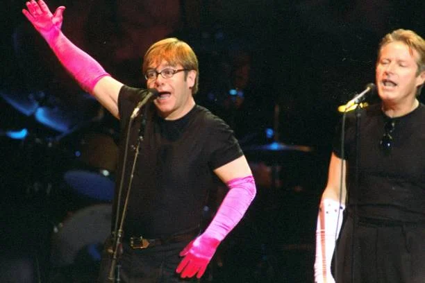 UNITED STATES - APRIL 12: Elton John (left) performing at a benefit concert for the Rain Forest Foundation International at Carnegie Hall