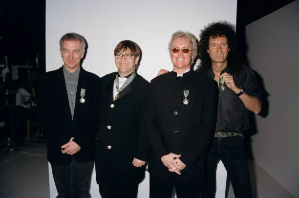 Queen + Bejart : Ballet For The Masses British singer Elton John performs with British rock band 'Queen' for the 'Queen + Béjart: Ballet For The Masses' project -