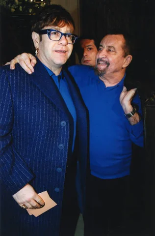 Elton John and Maurice Béjart in 1997 Elton John and Maurice Béjart at the Versace Haute Couture Spring/Summer 1997 fashion show in Paris on January 18, 1997, France.