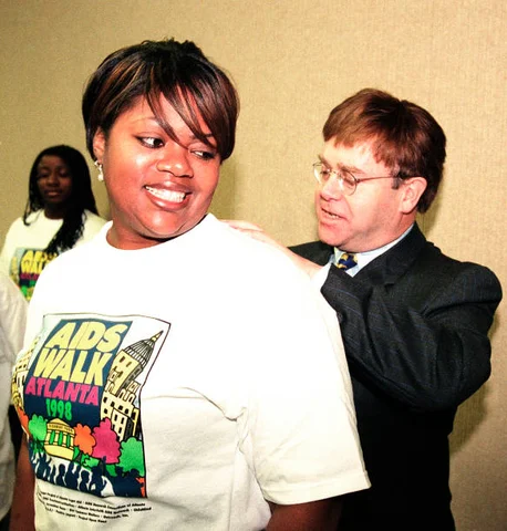 Elton John Aids Walk - Atlanta - 10-11-1998 ATLANTA OCTOBER 11: Elton John surprises volunteers during Aids Walk Atlanta 1998 in and around Atlanta Georgia, October 11, 1998